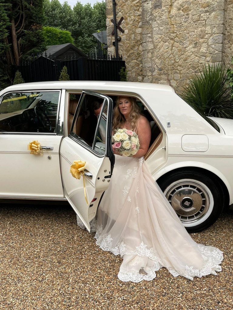 Bride arriving in luxury wedding car in Kent with Lady R chauffeur service